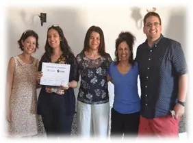 student group photo holding certificate